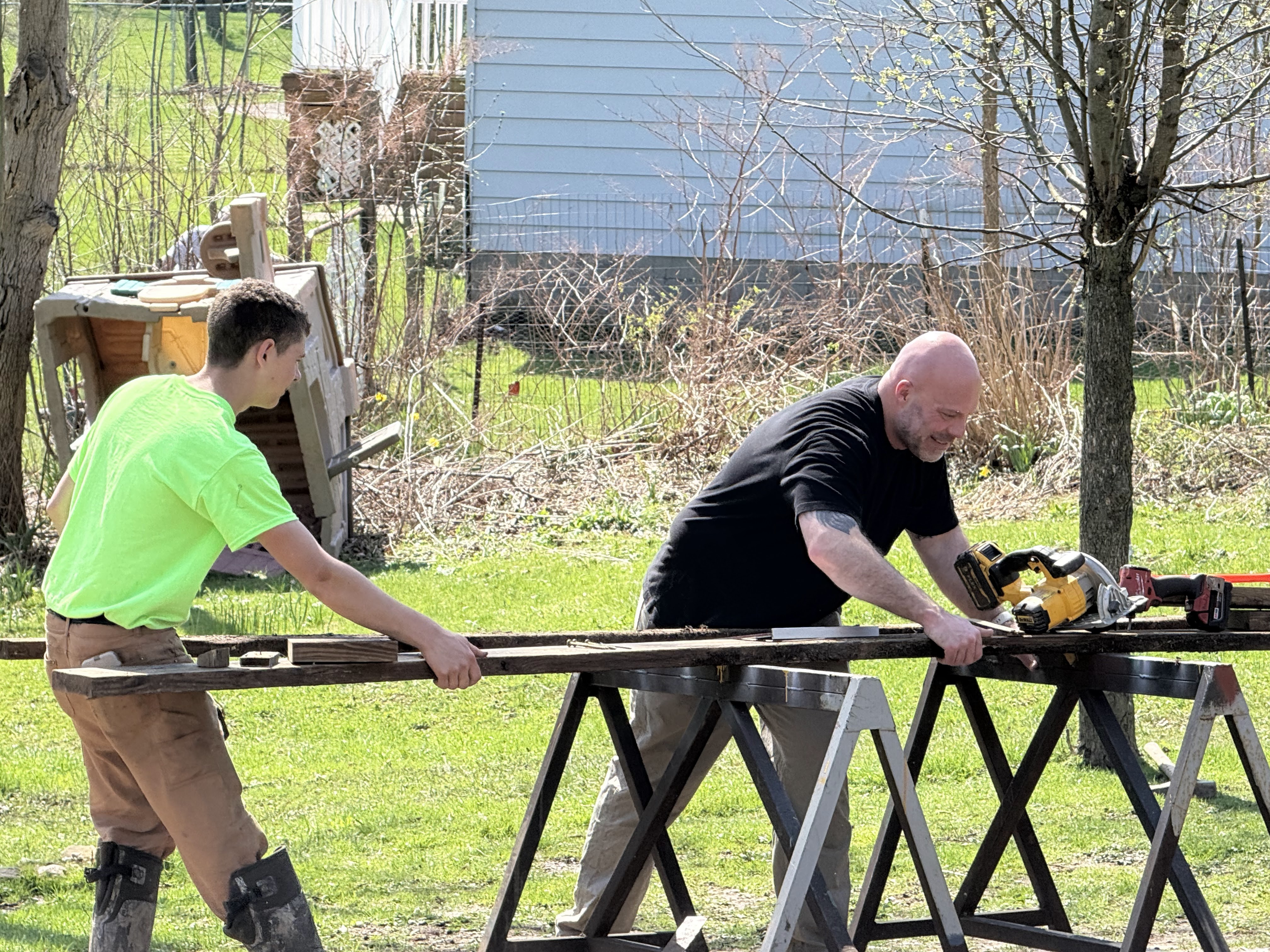 Johnny and Lijah cutting boards